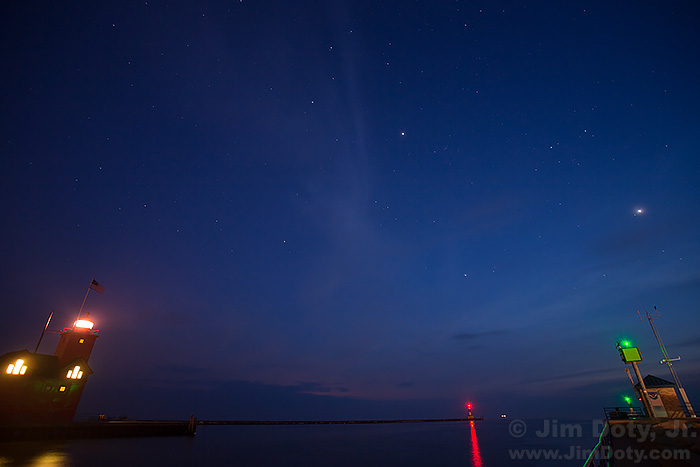 Venus and Jupiter over "Big Red" and the Holland breakwater light. Field trip, photography workshop at Grand Rapids, Michigan.