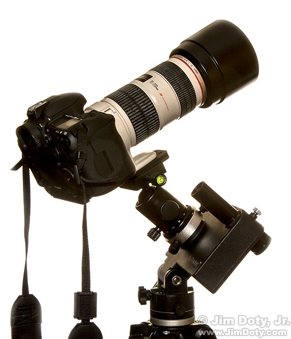 Camera and telephoto lens mounted on an iOptron Sky Tracker and iOptron ball head.