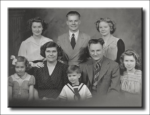 Grandpa, Grandma, and their six children.